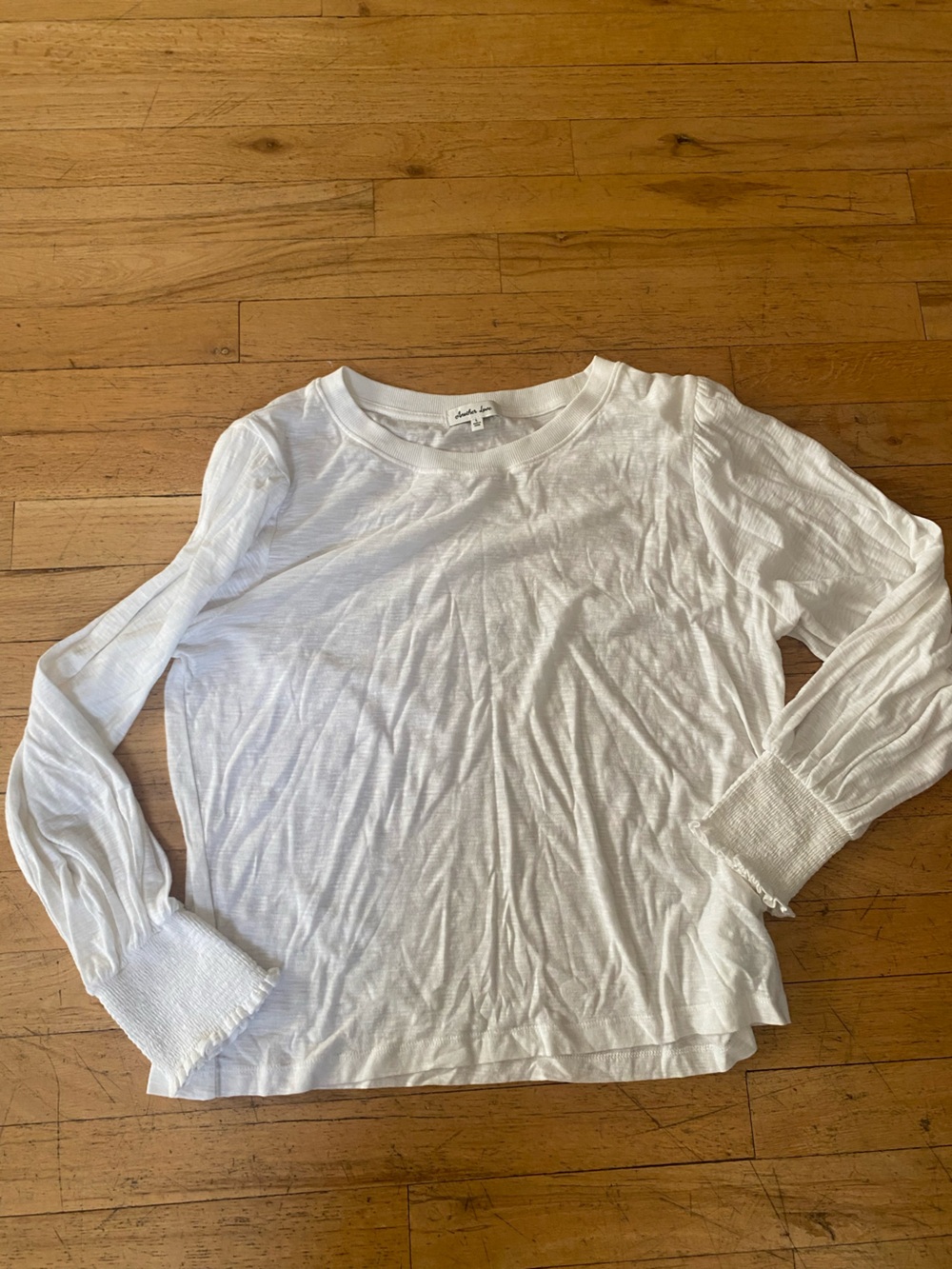 Another love basic  white top. A little puff sleeve. Gathered by sleeve. Large